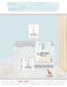 a baby's nursery room with blue walls and white cribs, including a sailboat bedding set