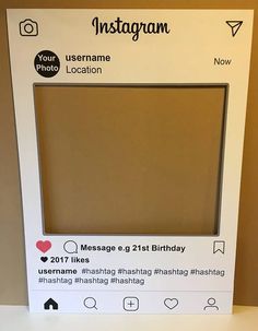 an instagram photo frame is displayed on a table