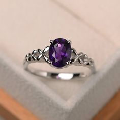 Oval Amethyst Ring In White Gold For Anniversary, Oval White Gold Amethyst Ring For Anniversary, Elegant Sterling Silver Amethyst Ring Oval Cabochon, Elegant Oval Purple Rings, White Gold Amethyst Promise Ring With Oval Shape, Oval Amethyst Promise Ring In White Gold, White Gold Oval Amethyst Promise Ring, Oval White Gold Amethyst Promise Ring, Classic Silver Amethyst Ring With Oval Cabochon