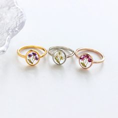 Pressed Flower Rings | Handmade Real Flower Rings | Christmas Gift | Bridesmaid Gifts | Birthday Gift for Mom | Resin Gift | Gift for Her ✨️The Pressed Flower Rings are beautiful and delicate pieces of jewelry that are handcrafted with love and attention to detail. Each ring features a real pressed flower that is carefully encased in a clear resin, preserving its natural beauty and vibrant colors. These rings make for stunning accessories, adding a touch of nature-inspired elegance to any outfit. -------------------------------------------------- ✨️ H I G H L I G H T S - Handmade with Love and Attention to Detail: Each pressed flower ring is meticulously crafted by skilled artisans, ensuring that every piece is unique and beautifully made. - Versatile and Stylish: The minimalist design of Pressed Flower Rings, Delicate Flower Ring As Gift, Delicate Flower Ring As A Gift, Delicate Flower Shaped Ring For Gift, Delicate Rose Gold Flower Ring For Gift, Delicate Pink Flower Ring For Gift, Delicate Pink Flower Ring Gift, Delicate Pink Flower Ring As Gift, Rose Gold Flower Ring For Gift