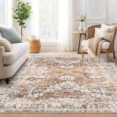 a living room with a couch, chair and rug