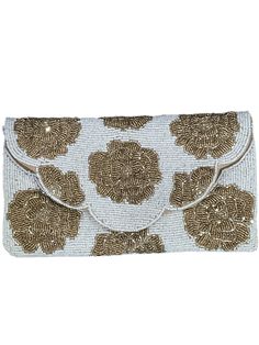 This handmade high-quality beaded clutch is an ideal accessory for any special event or night out. The intricate beading adds texture and a unique style to your look. The clutch is practical, yet stylish, with an adjustable chain strap and a secure closure. Whether using it as a clutch or crossbody, this bag is sure to make a statement. Measurement: 9.5”L x 5.5”H Chic Hand Embellished Clutch For Party, Chic Beaded Clutch For Events, Rectangular Beaded Clutch For Festive Occasions, Chic Hand Embellished Clutch For Events, Evening Beaded Clutch, Chic Beaded Evening Bag For Events, Glamorous Beaded Clutch As Gift, Chic Beaded Clutch As A Gift, Elegant Evening Clutch With Gold Beads