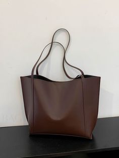 BagForLove - Streamlined Shoulder Tote: Ultimate Simplicity in Style Product Description Color Brown Strap Type Double Handle Style Elegant Bag Size Medium Pattern Type Plain Type Shoulder Tote Bag Material PU Leather Composition 100% Polyester Size Chart INCH CM Bag Length Bag Width Bag Height Handle Height 16.9 inch 4.7 inch 11 inch 11 inch Bag Length Bag Width Bag Height Handle Height 43 cm 12 cm 28 cm 28 cm Details Pictures Similar Products h2 { text-align: center; } /* æ¢è¡ */ li{ white-s Medium Shoulder Bag, Womens Work Bag, Uni Bag, Minimalist Tote Bag, Brown Tote Bag, Work Tote Bag, Elegant Bags, Brown Tote, Fancy Bags