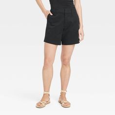 These High-Rise Tailored Everyday Shorts from A New Day™ are a staple piece for your summer ensembles. They're made of midweight cotton with spandex for comfortable wear that moves with you. Featuring a flattering high-rise silhouette, these twill shorts in a solid hue provide versatility, allowing you to easily dress them up or down for any occasion. A belt-loop waistband with a zip fly and hook closure provides a secure fit, while the side slash pockets lend functional style. A New Day™: Style Maternity Jean Shorts, Everyday Shorts, Midi Jeans, Eyelet Shorts, Functional Style, Cutoff Jean Shorts, Tailored Shorts, Twill Shorts, Fleece Shorts