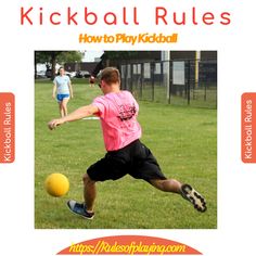 a man kicking a yellow soccer ball on top of a lush green field with people in the background