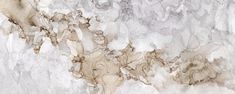 an abstract marble wallpaper with white and brown paint on the top, bottom and bottom