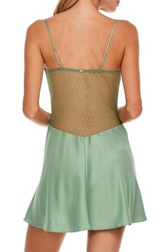 This alluring chemise features floral lace that descends down a sheer, netted bodice to a flowy skirt. 24" center front length (size Medium) Sweetheart neck Adjustable straps 100% polyester with 100% nylon contrast Hand wash, dry flat Imported Sheer Lace Slip Dress For Night Out, Night Out Lace Slip Dress With Lace Bodice, Fitted Lace V-neck Chemise, Sheer Lace Slip Dress For Party, Sheer V-neck Slip Dress For Wedding Night, Sheer Bodice Dress For Night, Lace Slip Dress For Night In Spring, Spring Lace Slip Dress For Night, Sheer Mesh Camisole For Summer