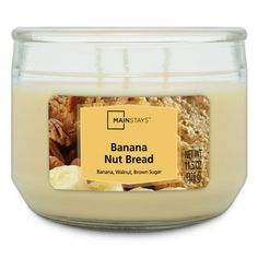 banana nut bread in a glass jar on a white background with an orange label that says bannana nut bread