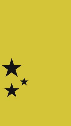 three black stars on a yellow background