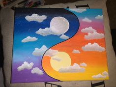 a painting with clouds and the shape of a yin - yang sign painted on it