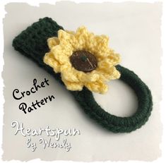 a crochet pattern for a hair tie with a sunflower