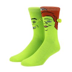 Discover the whimsical world of Shrek with these men's green casual crew socks that bring the beloved characters Shrek and Fiona to life. The green socks feature detailed images of their faces, complete with 3D ogre ears, adding a touch of ogre-inspired charm to your everyday attire. Designed to fit men's shoe sizes 10-13 and 8-12, these officially licensed socks are crafted with precision from 98% polyester and 2% spandex, ensuring both comfort and durability. Easily maintain their vibrant desi Fun Green Cotton Socks, Shrek Socks, Shrek And Fiona, Shrek Fiona, Fiona Shrek, Green Socks, Cozy Socks, Men's Shoe, Funny Socks