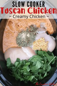 the slow cooker is filled with creamy chicken and spinach leaves for an easy dinner