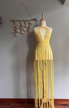 Material: 2mm cotton rope Macrame dress size is S color: Yellow Customs and import taxes Buyers are responsible for any customs and import taxes that may apply. I'm not responsible for delays due to customs Beachwear Backless Dress For Party, Summer Party Beachwear Halter Dress, Beachwear Sundress For Beach Season Party, Summer Beachwear Halter Dress For Party, Party Halter Neck Sundress For Beach, Beachwear Style Backless Maxi Dress For Party, Fitted Maxi Beach Dress For Festivals, Fitted Hippie Maxi Dress For Summer, Fitted Halter Dress For Summer Beach Party