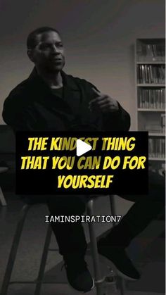 a man sitting on top of a chair in front of a book shelf with the words,