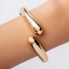 420112249300110944102115455988 Material: gold plated brass Diameter: 2.5" IMPORTED Chic Gold-tone Cuff Bangle Bracelet, Polished Brass Bangle Cuff Bracelet, Modern Tarnish-resistant Cuff Bangle, Gold Stainless Steel Tarnish-resistant Cuff Bracelet, Luxury Tarnish-resistant Gold-plated Cuff Bracelet, Pearl Cuff, Choker Necklace Set, Silver Jewels, Simple Bracelets