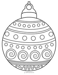 a black and white christmas ornament with circles on the top, in an oval shape