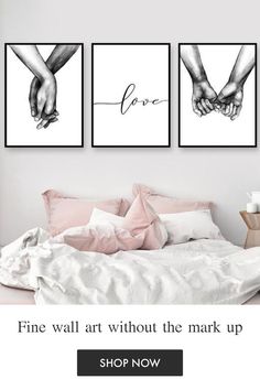 three black and white prints hanging on the wall above a bed with pink linens