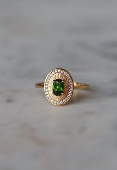 Genuine Green Tourmaline Ring: 18K Gold Plated, Silver Gemstone Ring 💍✨ Elevate your style with our Genuine Green Tourmaline Ring.  This exquisite piece features a stunning green tourmaline gemstone set in a delicate design with 18K gold plating over sterling silver.  Perfect as a birthstone ring, statement ring, or a special gift for her, this ring adds a touch of elegance to any outfit. 💚🌟 Key Features: Genuine Green Tourmaline: Showcases a vibrant, natural green tourmaline gemstone, known Gold Tourmaline Ring With Accent Stones, Gold Tourmaline Ring For May Birthstone, Oval Tourmaline Ring For May Birthstone, Green Tourmaline Rings With Halo Setting, Green Tourmaline Ring With Halo Setting, Tourmaline May Birthstone Promise Rings, Elegant Tourmaline Open Ring, Tourmaline Promise Ring For May Birthstone, Fine Jewelry Tourmaline Ring For May Birthstone