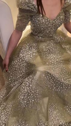 Luxury Sequin Tulle Dresses, Luxury Ball Gown For Party, Luxury Embellished Gown For Party, Luxury Festive Evening Dress For Wedding, Luxury Festive Wedding Evening Dress, Glamorous Gold Tulle Dresses, Green Ball Gown For Prom Season Party, Green Ball Gown For Party And Prom Season, Glitter Gown For Party Season