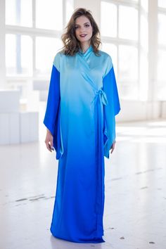 "Satin kimono dress with color transitions in shades of blue Light and airy \"Wings\" sewn into the sleeves, which complement the airy image of the dress ➤ Features > dress length: 58,5 inches / 148cm cm ➤ Sizing My Size Guide in FAQ section below will help you define the perfect size match. The item can also be made according to your measurements - just message them to me. ➤ Delivery Your item is made-to-order and will be ready within 2-7 days. Average delivery times: > North America: up Blue Wrap Maxi Dress For Spring, Blue Wrap Dress For Summer, Long Blue Dress For Beach Cover-up, Blue Kimono Sleeve Robe For Summer, Blue Summer Robe With Kimono Sleeves, Blue Robe With Kimono Sleeves For Summer, Spring Blue Maxi Dress With Kimono Sleeves, Blue Wrap Maxi Dress For Summer, Blue Summer Beach Cover-up Robe