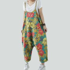 Introducing our 2023 Spring-Summer Collection's floral print baggy denim jumpsuit ââ‚?the perfect fusion of y2k mode and fashion-day flair!Why It's a Must-Have for Your WardrobeThis denim jumpsuit is designed to make you stand out from the crowd with its steady year-2000-inspired trend and painted floral print. The baggy cut and straps closure make sure you stay casual all day long without compromising on the trendiness. Plus. the durable and elevated-quality denim material ensures that you can Summer Overalls With Relaxed Fit, Patterned Printed Jumpsuits And Rompers For Spring, Bohemian Jumpsuits And Rompers With Pockets For Spring, Summer Cotton Jumpsuit With Relaxed Fit, Summer Overalls With Pockets For Spring, Bohemian Printed Jumpsuits And Rompers For Spring, Bohemian Overalls With Pockets For Spring, Bohemian Cotton Overalls For Spring, Casual Printed Patterned Jumpsuits And Rompers