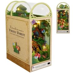 a cardboard box with an image of a forest scene in the front and inside it