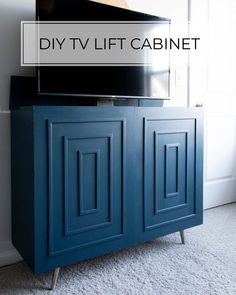 a blue cabinet with the words diy tv lift cabinet