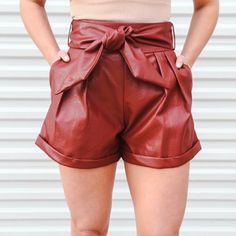 Leather Shorts With Zipper In The Back. Pockets. Belt That Ties. Never Worn. Still Tagged. Maroon Color. Summer Faux Leather Bottoms For Going Out, Leather Bottoms For Going Out In Summer, Casual Faux Leather Bottoms For Summer, Casual Party Shorts For Fall, Casual Fall Party Shorts, Summer Casual Faux Leather Bottoms, Summer Brown Faux Leather Bottoms, Casual Faux Leather Shorts For Going Out, Casual Faux Leather Shorts For Party