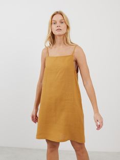 DEVON is a square neck strap mini linen dress which combines modern minimalism with a breathable fit, ideal for warm climates and summer events. Its sophisticated square neckline and a strap design make it versatile for both casual days and elegant evenings. DETAILS - Square neckline - Spaghetti straps - Mini length - 100% midweight European linen fabric - Cut and sewn to order just for you in our studio COLOR - Yellow Honey, you can also choose other colors above - Fabric samples are available Spring Linen Mini Dress With Straight Neckline, Linen Mini Dress With Straight Neckline For Spring, Spring Mini Dress In Linen With Straight Neckline, Spring Mini Dress With Straight Neckline In Linen, Linen Mini Dress With Square Neck, Unlined Linen Dress With Straight Neckline For Spring, Spring Linen Mini Dress With Square Neck, Linen Mini Dress With Square Neck For Brunch, Chic Linen Mini Dress With Square Neck