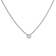 Our classic 14k gold pendant necklace features a solitaire round brilliant diamond, bezel set and suspended from a dainty chain - a subtle yet timeless sparkle from Gilded by G.St. Able to special order in rose or white gold- please allow 5 weeks for production and delivery. • 14k gold• 0.20ct round brilliant diamond (G-H color, SI clarity)• Spring ring clasp• Length: 16-17" All G.St collections are designed and crafted by us in NYC using recycled gold, conflict-free diamonds and responsibly sou Classic Solitaire Necklace With Bezel Setting, Classic Necklace With Smooth Bezel, White Gold Solitaire Necklace With Bezel-set Round Stone, Classic Round Necklace With Smooth Bezel, Elegant Formal Necklace With Smooth Bezel, Elegant Smooth Bezel Necklace For Formal Occasions, Classic Anniversary Necklace With Smooth Bezel, Classic Solitaire Pendant Necklace With Bezel Setting, Formal Solitaire Necklace With Delicate Chain And Round Pendant