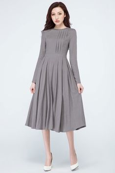 Chic Gray A-line Dresses, Gray Pleated Dress For Spring, Long Sleeve Dresses With Box Pleat For Work, Elegant Gray A-line Midi Dress, Fall Long Sleeve Dress With Accordion Pleats, Fall Dresses With Accordion Pleats And Long Sleeves, Chic Long Sleeve Gray Midi Dress, Chic Gray Long Sleeve Midi Dress, Fitted A-line Long Sleeve Pleated Dress