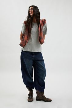 Need-now BDG horseshoe jeans in a slouchy, barrel silhouette. Designed in a rigid denim featuring a mid-rise waistline and tapered barrel-leg fit. Only at Urban Outfitters. Features BDG Horseshoe barrel jeans Barrel leg jeans Rigid non-stretch denim Mid-rise waistline Horseshoe wide leg with tapered ankle Slouchy, relaxed fit Full length 5-pocket styling Zip fly and button closure UO exclusive Content + Care 80% Cotton, 20% recycled cotton Machine wash Imported Size + Fit Mid-rise Tapered wide l Jeans Grunge Outfit, Horseshoe Silhouette, Horseshoe Jeans, Jeans Grunge, Barrel Jeans, Bdg Jeans, Horse Stuff, Grunge Outfits, Recycled Cotton