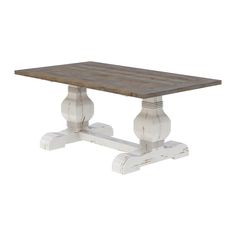 a wooden table with two white legs and an old - fashioned design on the top