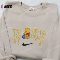 Introducing the Winnie The Pooh x Nike Embroidered Sweatshirt – a delightful collaboration between two iconic brands. This cozy sweatshirt Nike Embroidered Sweatshirt, Nike Inspired, Cute Nike Outfits, Embroidered Shirts, Cartoon Shirts, Cute Shirt Designs, Shirt Nike, Hoodie Material, Nike Sweatshirts