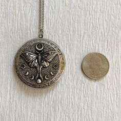 Extra Large Luna Moth Locket Necklace Silver Embossed Locket | Etsy Spiritual Silver Locket Necklace, Spiritual Silver Metal Locket Necklace, Bohemian Silver Locket Necklace, Nickel-free Silver Bohemian Locket Necklace, Bohemian Silver Locket Necklace With Round Pendant, Locket Necklace Silver, Necklace Locket, Silver Locket Necklace, Small Icons