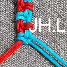 an orange and blue piece of fabric with the word jhl on it