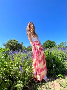 Say "summer vibes" in style with these classic wide-leg tie dye pants! Featuring a cool tie dye indigo color, pockets and a drawstring waist, these pants are perfect for all your summer adventures. Ready, set, slay! Team with a cool crop and your favorite tee, so you can wear it at home, on the beach, or your next party! Available in 3 colors. Features: Handmade Tie-dye Lightweight feel Very comfortable Elastic waistline Breathable Pockets Wide-leg Size + Fit: Model height is 165cm/5.5ft, Americ Pink Maxi Bottoms For Vacation, Full Length Wide Leg Pants For Summer Day Out, Summer Full Length Wide Leg Pants For Day Out, Summer Wide Leg Full Length Pants For Day Out, Summer Wide Leg Full-length Pants For Day Out, Pink Bohemian Maxi Bottoms, Pink Bohemian Maxi Length Bottoms, Bohemian Pink Maxi Bottoms, Spring Beach Full-length Wide Leg Pants