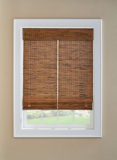 a window with bamboo blinds in it