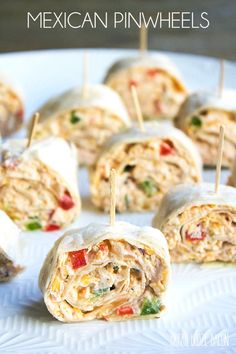 mexican pinwheels on a plate with toothpicks