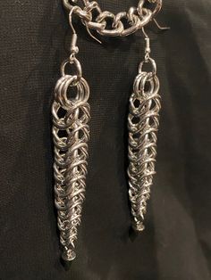 Lightweight chainmail earrings with a sterling silver back Chainmail Can Tab, Silver Dangle Jewelry With Box Chain, Sterling Silver Dangle Earrings With Box Chain, Silver Chainmail Metal Jewelry, Silver Dangle Earrings With Box Chain, Silver Metal Chainmail Jewelry, Silver Metal Jewelry With Chainmail, Silver Long Drop Box Chain Earrings, Silver Long Drop Earrings With Chain