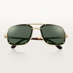 Cartier - Santos de Cartier sunglasses - Sunglasses Man Metal - Santos de Cartier sunglasses in smooth and brushed golden-finish metal, rectangular shape and gray lenses. Dimensions: lenses 58 mm, bridge 17 mm, temples 140 mm. Modern Gold Aviator Sunglasses With Square Frame, Modern Gold Square Frame Aviator Sunglasses, Modern Gold Shield Sunglasses With Square Frame, Cartier Gold Tinted Sunglasses, Gold Cartier Sunglasses With Gradient Lenses, Luxury Rectangular Sunglasses With Metal Frame, Cartier Gold Sunglasses With Tinted Lenses, Cartier Gold Sunglasses With Gradient Lenses, Modern Gold Cartier Sunglasses