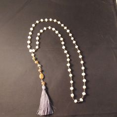 Excellent Estate Sale Find! Nwot Pearl Portion Of Necklace Is 14 In In Diameter, Total Length Of Necklace Is 20in Including Blue String Tassel. Glass Bead To End Of Tassel Is 6 In In Length. Beautiful Addition To Any Outfit! Pet And Smoke-Free. Bohemian Pearl White Necklaces With Round Beads, White Pearl Long Necklace With Gemstone Beads, Bohemian Pearl White Round Beaded Necklaces, Adjustable White Spiritual Pearl Necklace, Spiritual White Adjustable Pearl Necklace, White Spiritual Long Beaded Necklaces, Bohemian White Pearl Necklace, Bohemian White Pearl Necklace With Round Beads, White Pearl Spiritual Beaded Necklace