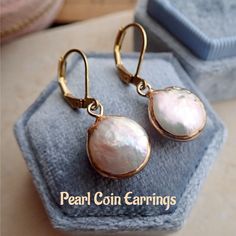 💎 These delicate coin dangle earrings in 14k gold are perfect for adding a classic touch to your look! 💍 #pearlcoinearrings #14kgold #jewelry#instacool #earrings #jewelrygram #bling #earringsoftheday #earring #jewelrydesigner #instajewelry #fashionjewelry #fashionjewelry #jewelryforsale #jewelryoftheday #etsyjewelry #etsyjewelry #jewelrymaker #handcraftedjewelry #artjewelry #etsyelite #etsyfinds #etsyfinds #etsyshop #etsyseller #earringaddict Coin Pearl Earrings, Abalone Jewelry, Boho Beachy, Beachy Vibes, Freshwater Pearl Earrings, Coin Earrings, Coin Pearls, Freshwater Pearls Earrings, Gold Coin