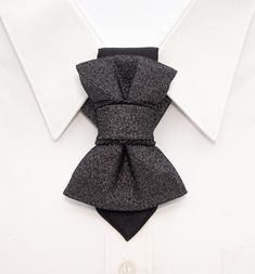 "Hopper tie is a new original product, presented by Ruty Design. This unisex accessory is a modern combination of elements found on traditional ties and bow ties. Why choose Hopper ties? If you value exclusivity and comfort, this is the accessory for you! The most important feature of the accessory for women - versatility! It, in addition to the usual way, can also be worn as a brooch and as a pendant (by inserting an existing chain, bow, etc. into its upper fold). The accessory can be additiona Cheap Elegant Business Ties, Luxury Elegant Ties For Business Casual, Luxury Professional Suit And Tie Accessories For Office, Luxury Elegant Evening Suit And Tie Accessories, Cheap Tie-side Bottoms For Parties, Luxury Modern Suit And Tie Accessories For Work, Luxury Solid Suit And Tie Accessories For Work, Luxury Elegant Suit And Tie Accessories For Workwear, Modern Suit And Tie Accessories For Party