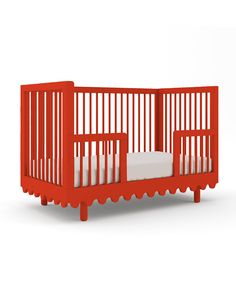 an orange crib with white sheets on the bottom and sides, in front of a white background