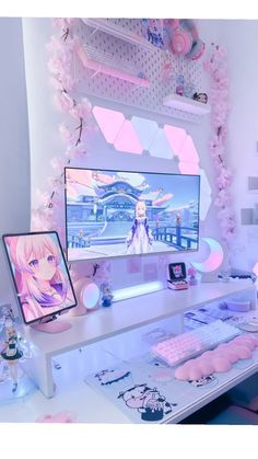 a white desk topped with a computer monitor and keyboard