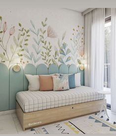 a room with a bed, rug and wallpaper on the walls is decorated in pastel colors