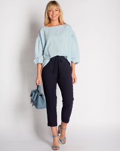 Relaxed Fit Bottoms With Pleated Waist For Daywear, Cotton Bottoms With Pleated Waist For Day Out, Chic Bottoms With Gathered Waist For Day Out, Relaxed Fit Paperbag Waist Pants For Work, Relaxed Fit Paperbag Waist Workwear Pants, Casual Spring Bottoms With Belted Cuffs, Relaxed Fit Pants With Gathered Waist For Spring, Casual Summer Pants With Belted Cuffs, Casual Blue Bottoms With Pleated Waist