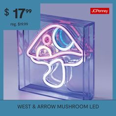 an advertisement for the west and arrow mushroom led light up display in a clear box